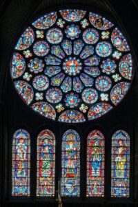 Sunlight reflecting off stained glass windows inside Chartres Cathedral